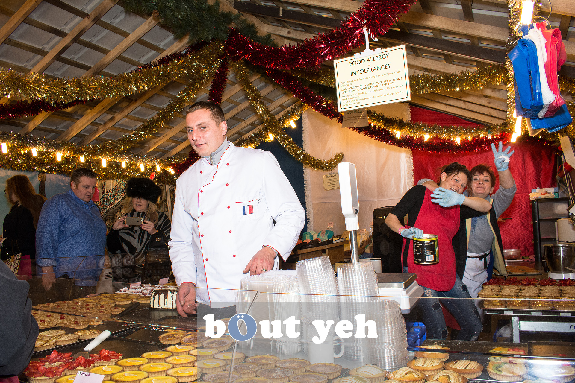 Workers at Belfast Christmas Market enjoying their work. Photo 3286.