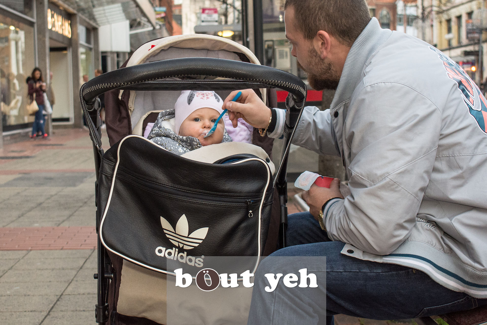 Man feeding baby, Royal Avenue, Belfast - photo 2831.