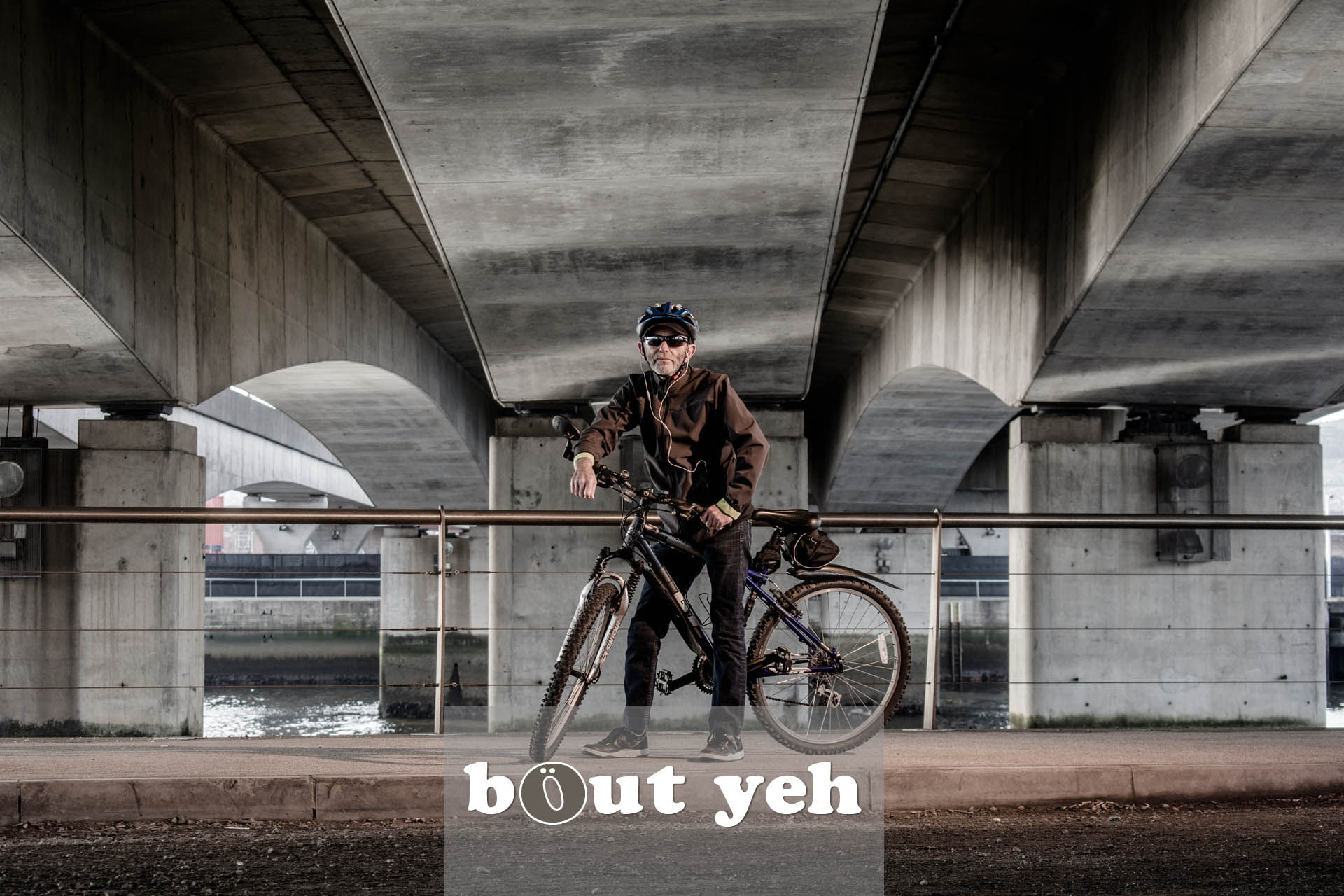 Jerry with bike under Dargan Bridge, Belfast - photo 5041, excluding call to action.