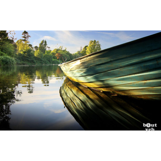 Rowing boat reflected in water - photographic print for sale. Photo by Glenda Hall.