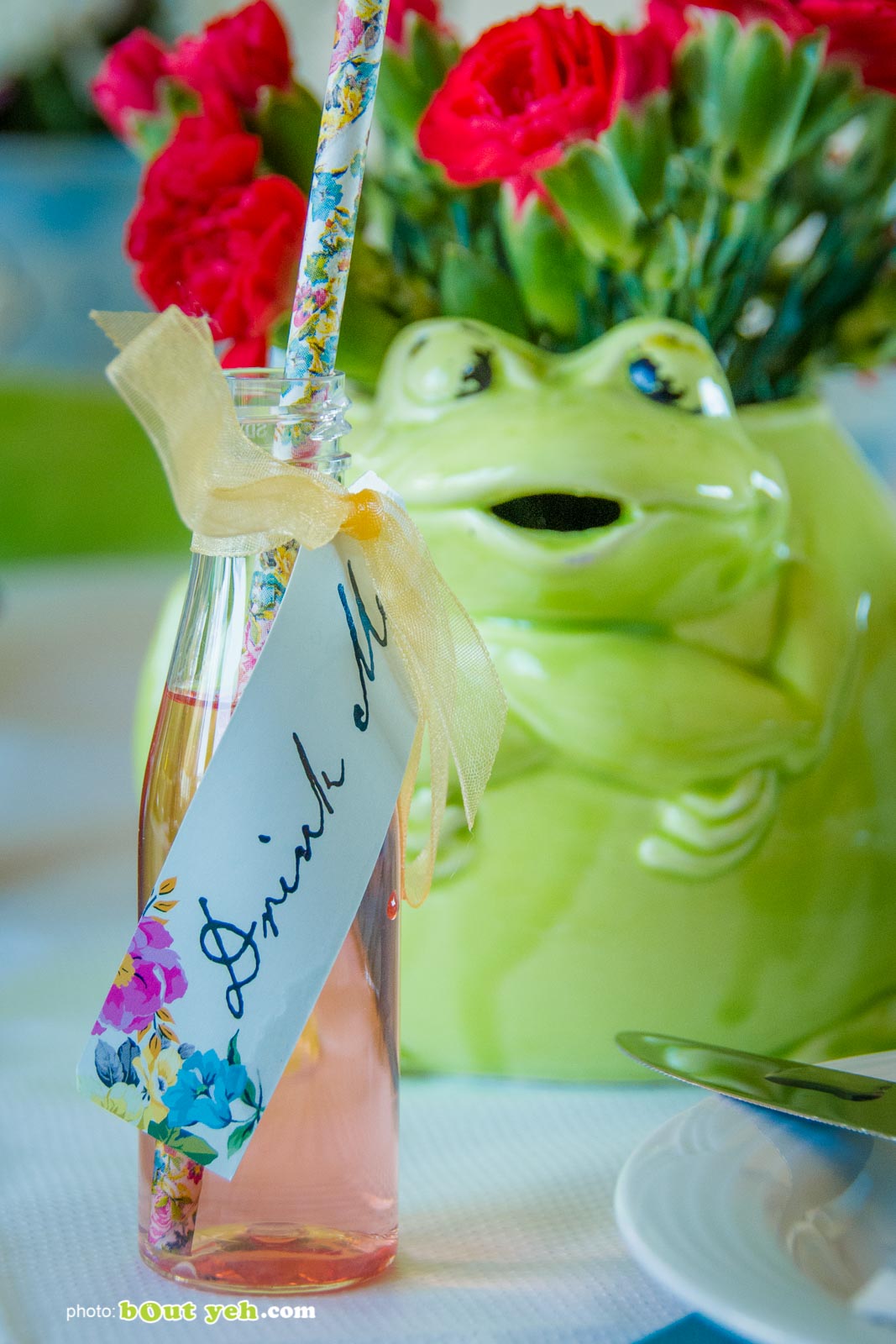 Drink Me illustration on small bottle at the Bout Yeh Brexit Mad Hatters Tea Party - photo 9233 by Bout Yeh photographers and video production Belfast Northern Ireland