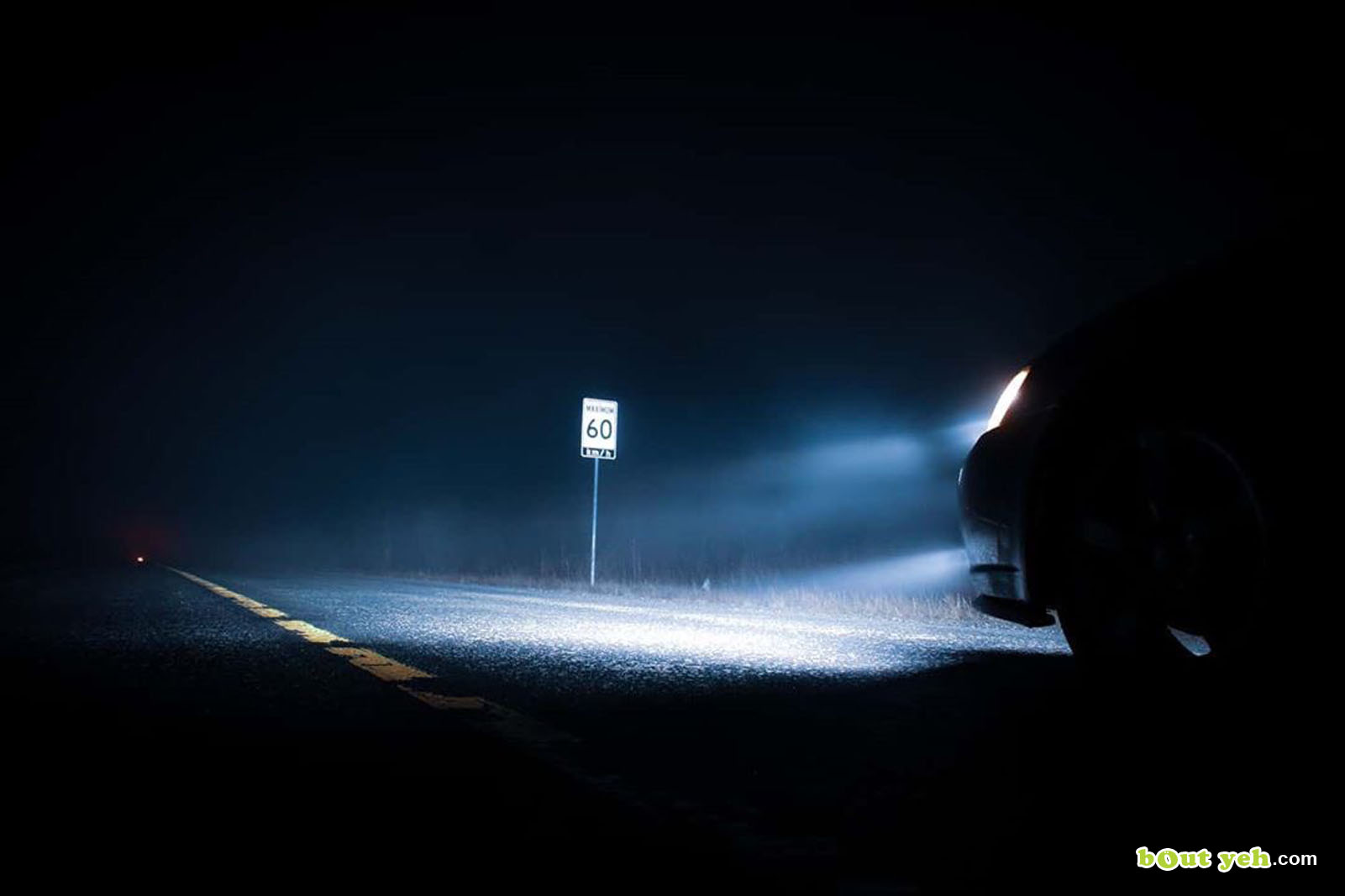 Photograph of road speed sign in car headlights at night by Robert McLaughlin - photo 5895 shared by Bout Yeh photographers Belfast