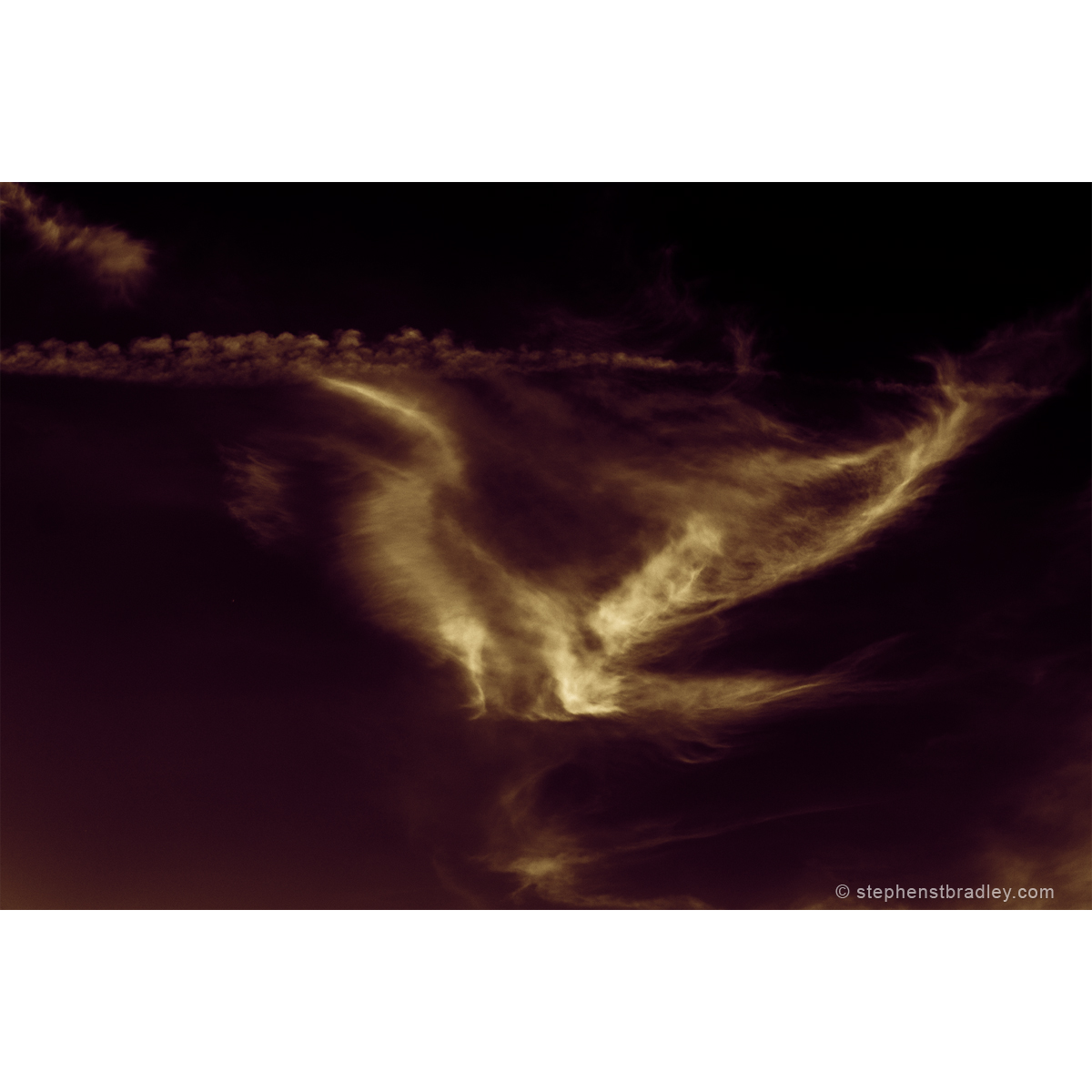 Freesoar - limited edition photographic print of birdlike cloud formation over Newtownabbey, Northern Ireland