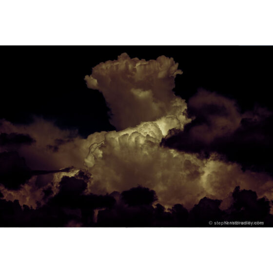 Night On Witch Mountain Redux - limited edition photographic print of a dramatic cloud formation over Mallusk, Northern Ireland, by photographer Stephen S T Bradley, for sale by Bout Yeh art gallery Belfast and Dublin