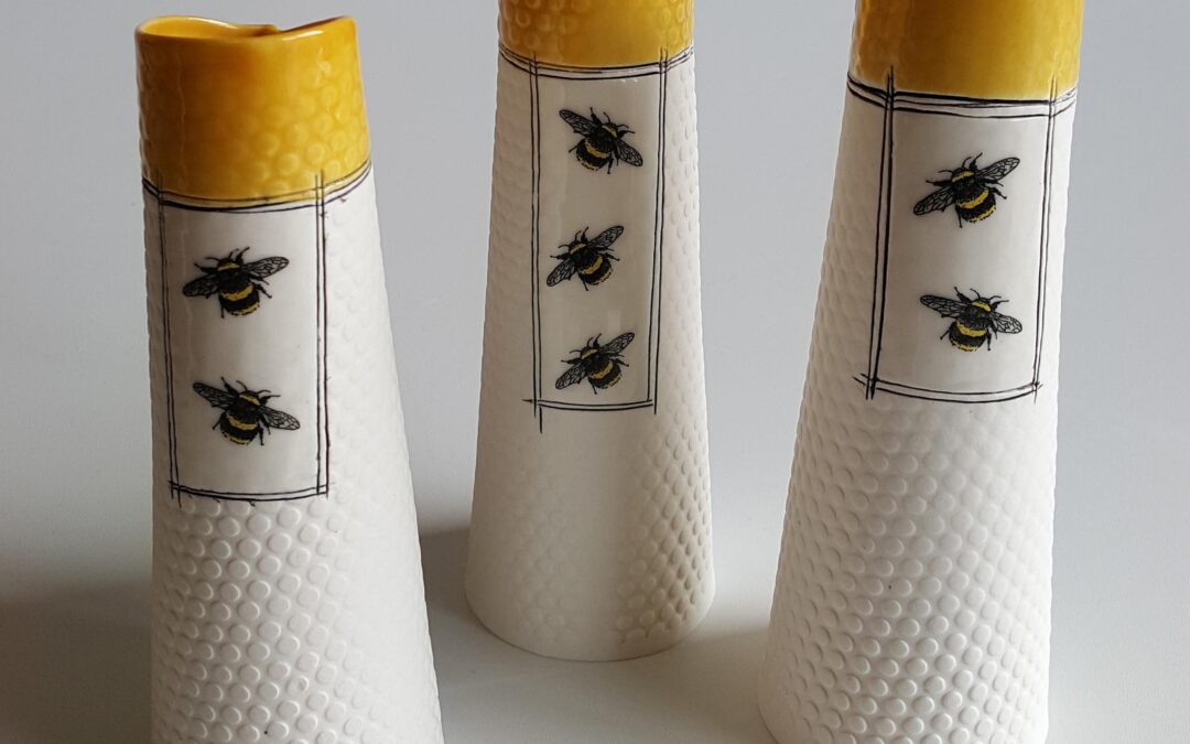 Tapered porcelain vase with bee’s by Red Earth Designs