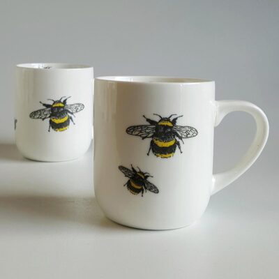 Ceramic mugs with bee decals. Irish ceramics an