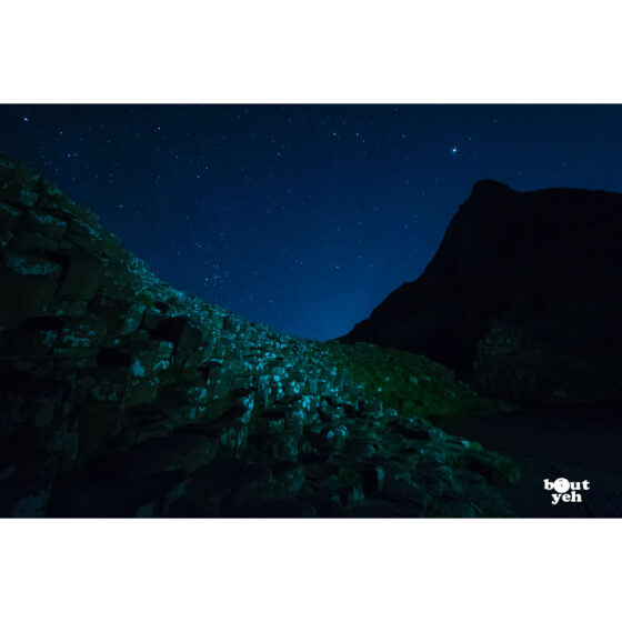 Photograph of Giants Causeway, Northern Ireland, under a star filled sky at night by Bout Yeh photographers Belfast. Photo 2764
